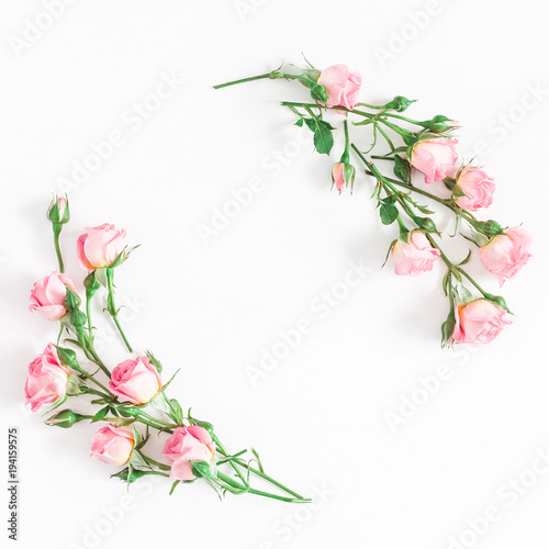 Flowers composition. Wreath made of pink rose flowers on white background. Flat lay, top view, copy space, square © Flaffy