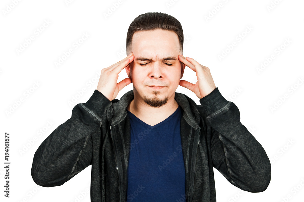 Worried bearded young man suffering from headache Worried bearded young man suffering from headache