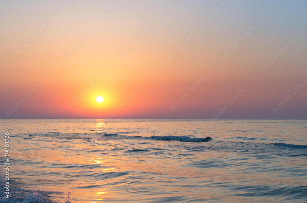 sunrise over the sea horizon, waves, splashes