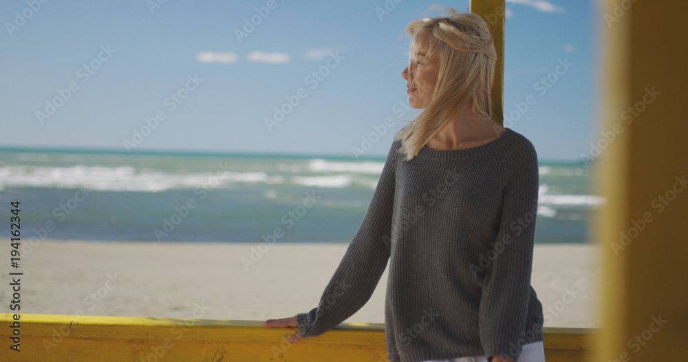 Fototapeta premium Young woman enjoying the warm autumn day