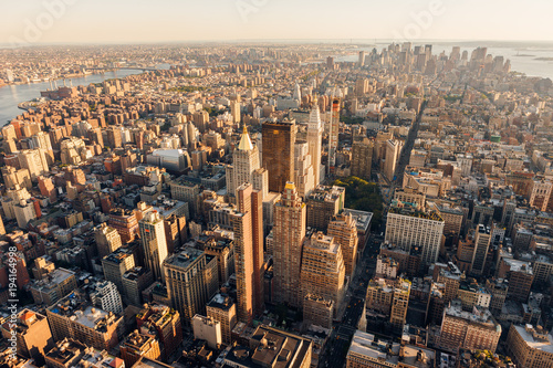 Aerial view at sunset of Manhattan below 30th Street  along 5th Avenue  including Midtown  Flatiron District  Chelsea  East Village  Lower Manhattan and the Financial District