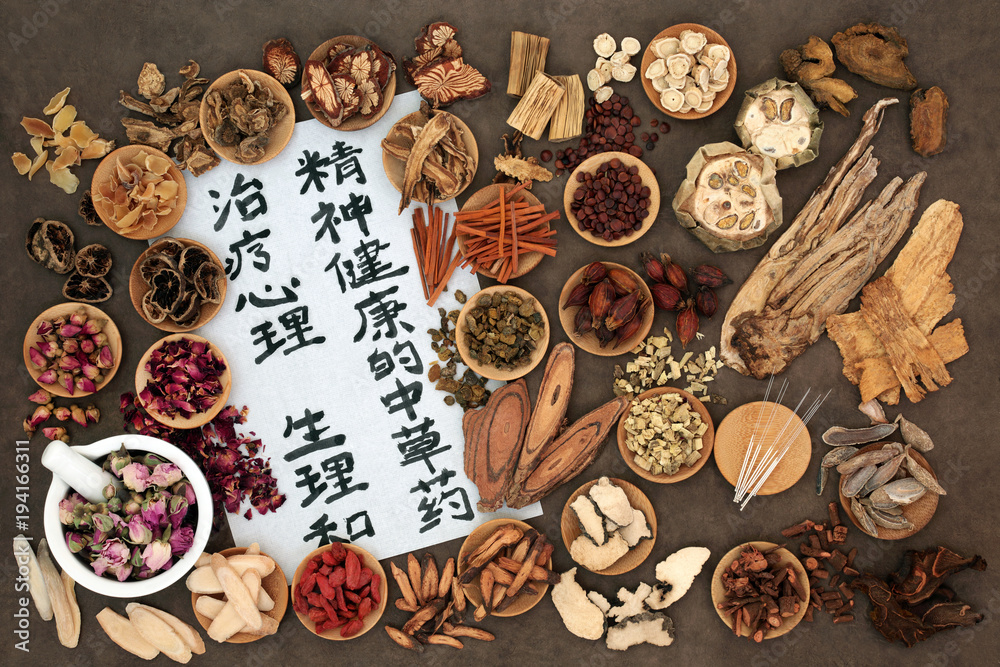 Chinese herbs used in herbal medicine with acupuncture needles and  calligraphy script on rice paper. Translation reads as traditional ancient  chinese medicine to heal mind body and spirit. Stock-Foto | Adobe Stock