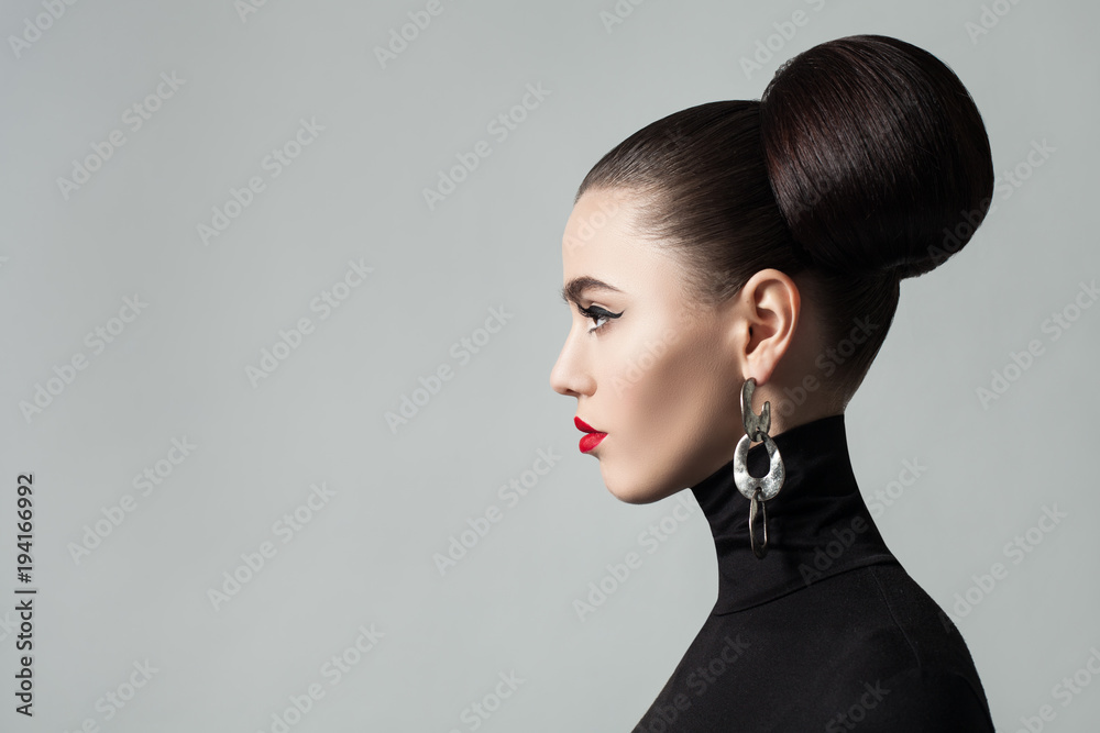 Fashion Portrait of Elegant Young Woman with Hair Bun Hairstyle and  Eyeliner Make up. Cute Female Model wearing Black Roll Neck Jersey, Profile  Portrait. Stock Photo | Adobe Stock