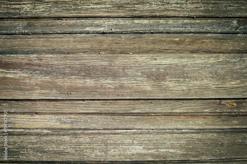 Closeup on old wood with natural textured grungy striped patterns weathered rough detail photo