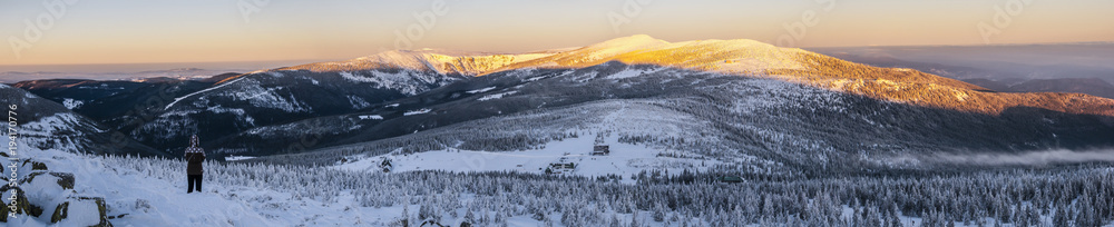 Winter morning in mountains during the sunset Winter morning in mountains during the sunset