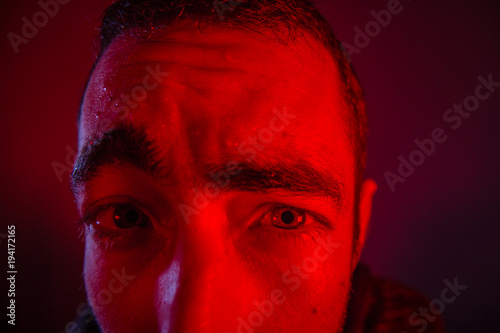 Sweating man looked sick or stoned