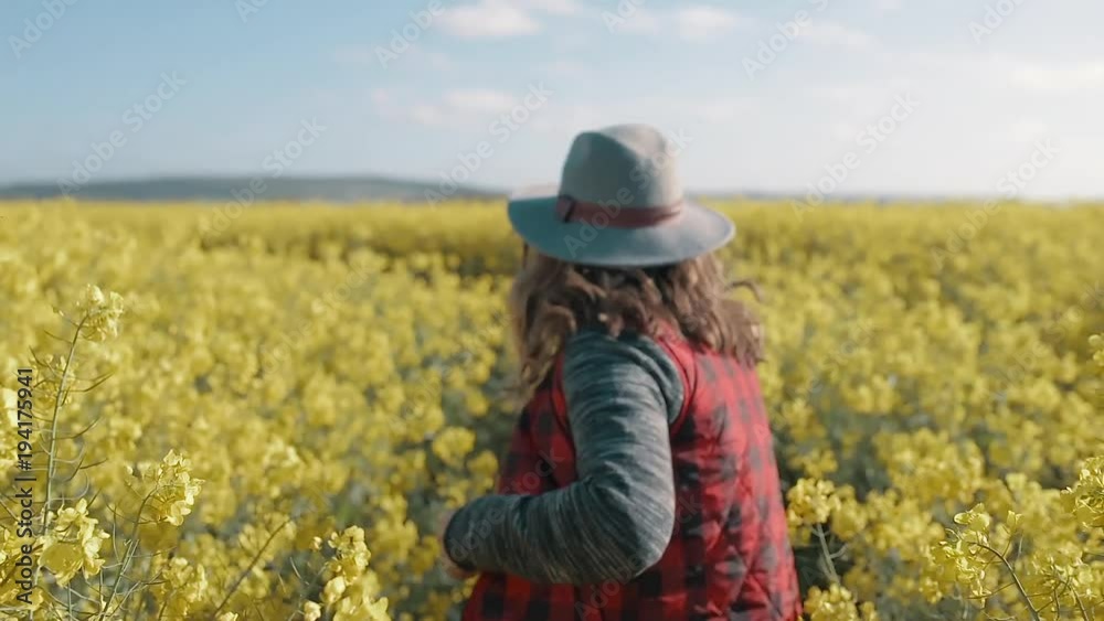 Slow Motion Happy Woman Running through Yellow Flower Field Smiling and Laughing Slow Motion Happy Woman Running through Yellow Flower Field Smiling and Laughing