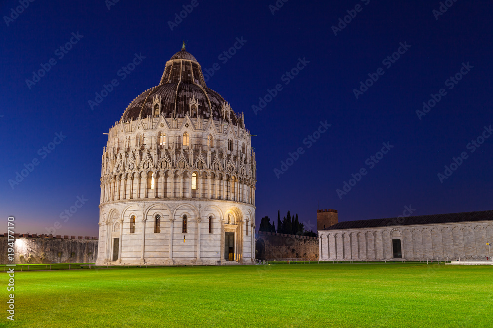 Pisa Baptistery in Square of Miracles at night. Pisa, Tuscany, Italy