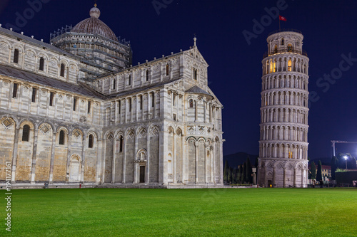 Night view of Leaning Tower of Pisa (Torre di Pisa) and Cathedral on Piazza dei Miracoli in Pisa, Tuscany, Italy.
