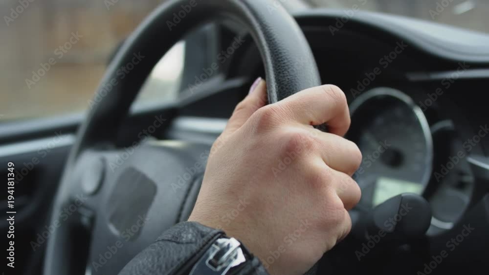 Closeup Of Woman Tapping Her Thumb On Steering Wheel, Along To Beat Of Music - Shot On Red Scarlet-W Dragon In 4K/ Slow Motion Closeup Of Woman Tapping Her Thumb On Steering Wheel, Along To Beat Of Music - Shot On Red Scarlet-W Dragon In 4K/ Slow Motion