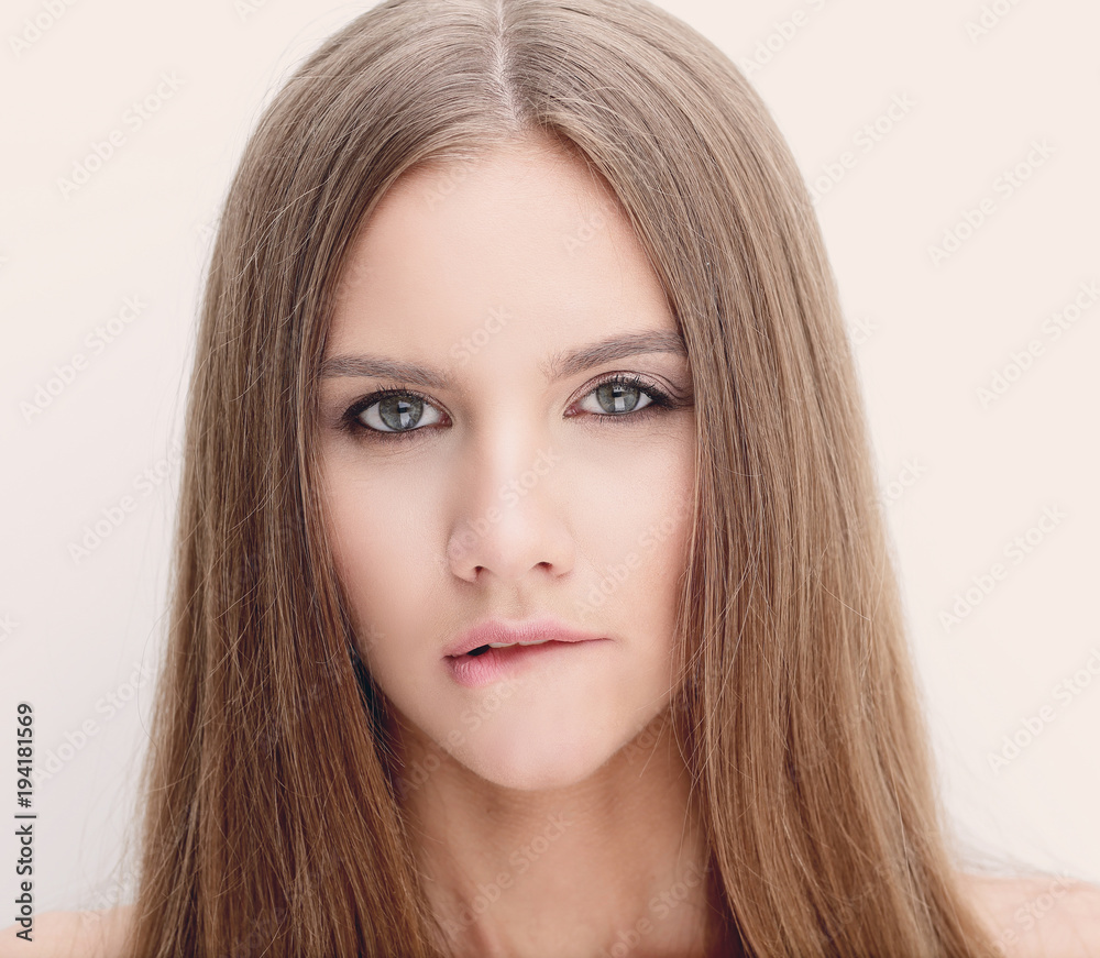 portrait of a young woman with long hair portrait of a young woman with long hair