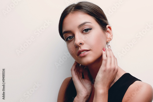 Portrait of a cute young woman with soft make-up