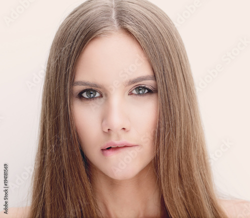portrait of a young woman with long hair