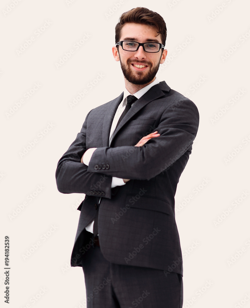 Young businessman standing with hands in pockets. Young businessman standing with hands in pockets.