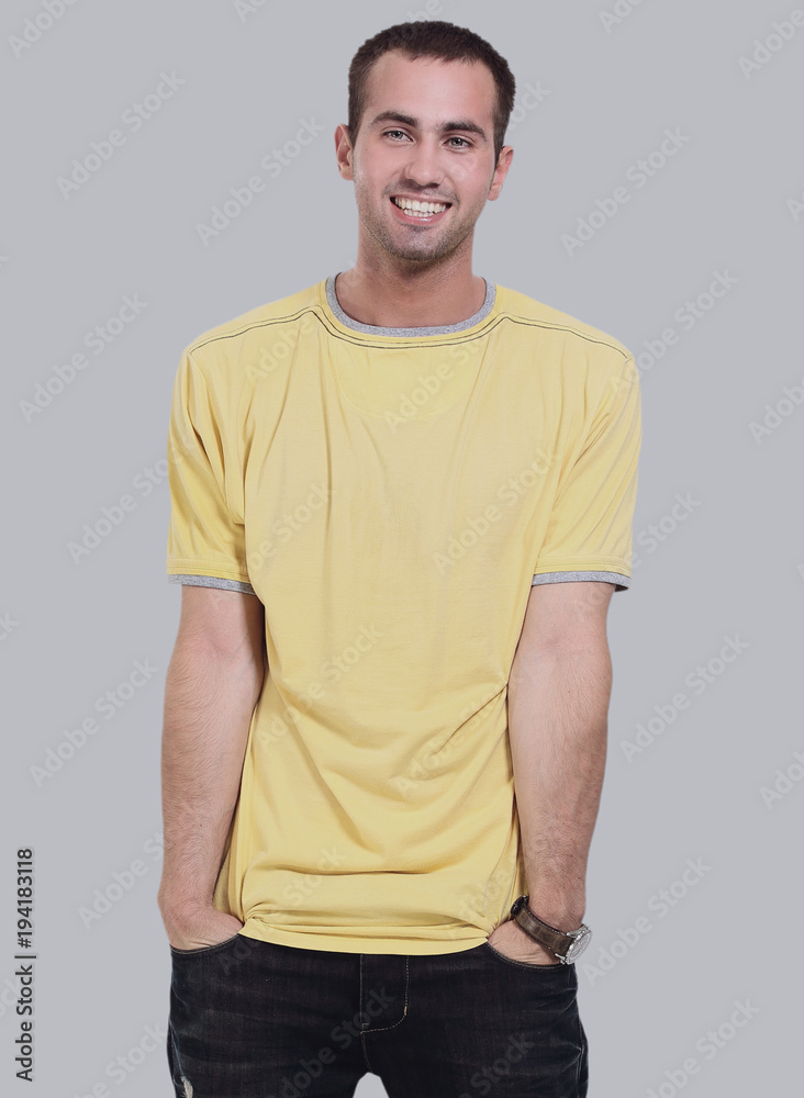 Fototapeta premium Young happy casual man portrait, isolated on gray background