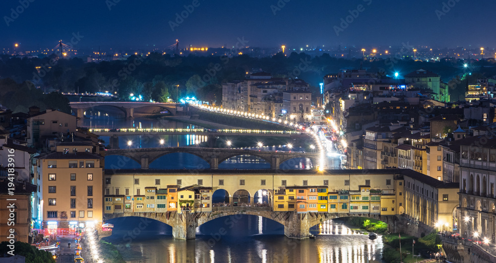 Famous Ponte Vecchio bridge at night in Florence, Tuscany
