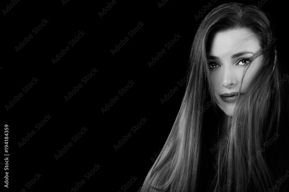 Long-haired beautiful woman with tousled hair style. Long-haired beautiful woman with tousled hair style.