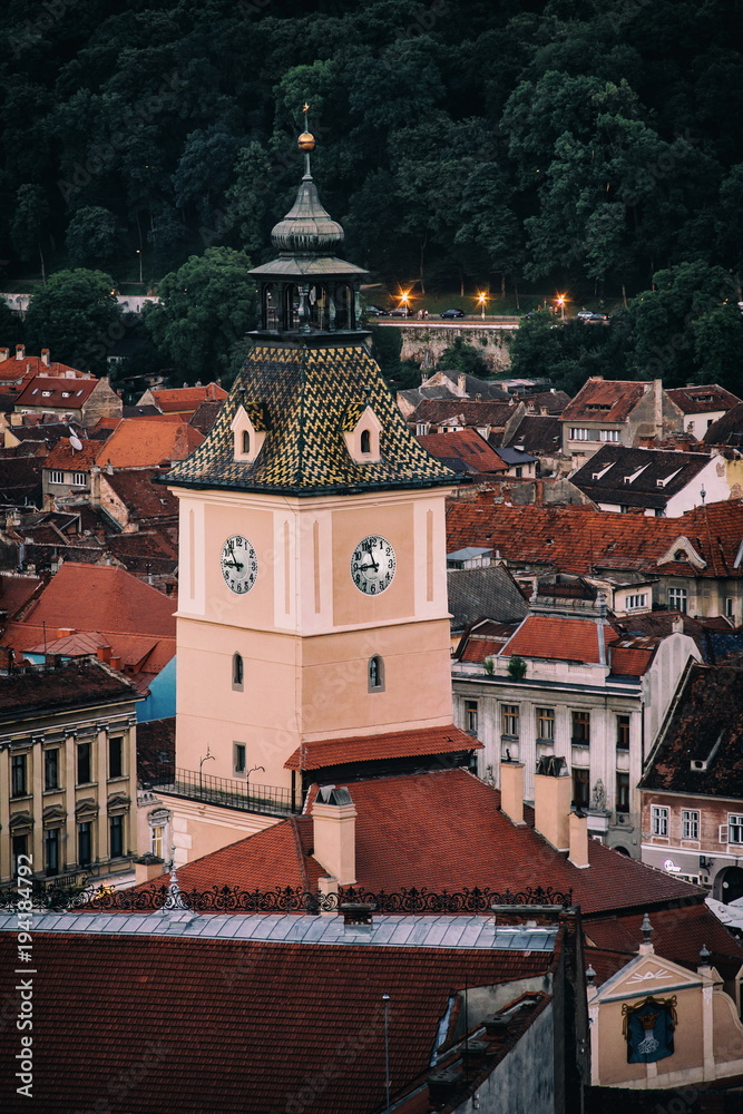 View of city hall clock tower of Brasov. Famous destination scenic  travel postcard. Transylvania, Romania.