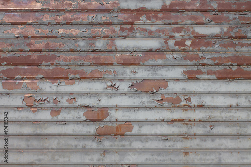 Rusty and lowered rolling shutter with parallel lines