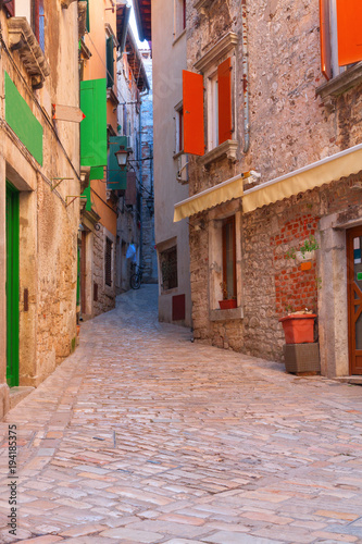 Calm, peaceful little tight narrow streets and colorful houses of Rovinj town