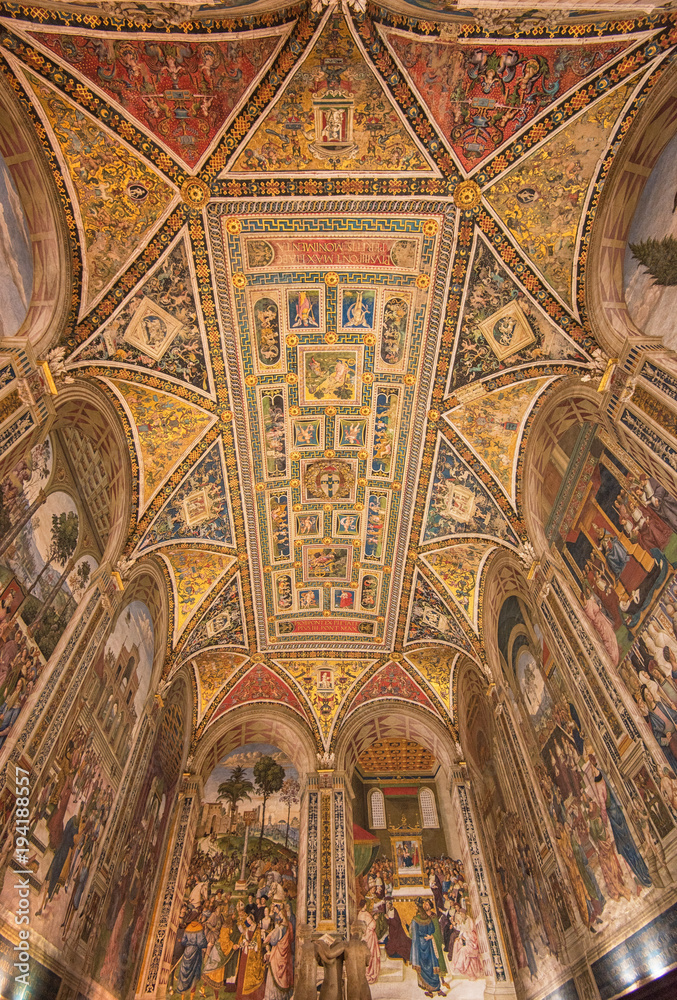 Amazing interior of Siena cathedral of Saint Mary Assumption, Piccolomini Library in Tuscany, Italy