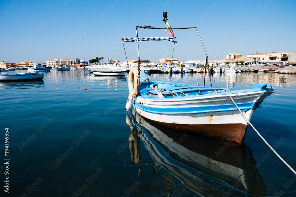 A beautiful blue boat in Marzamemi harbour, Sicily