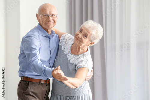 Cute elderly couple dancing...