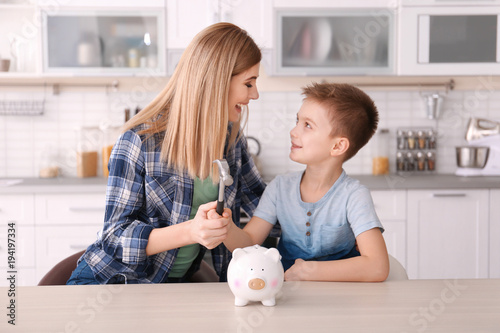 Mother with little son brea...