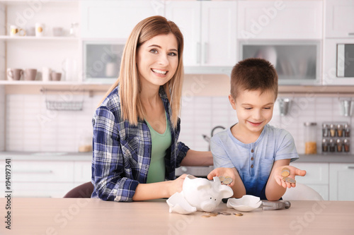Mother and little son with ...