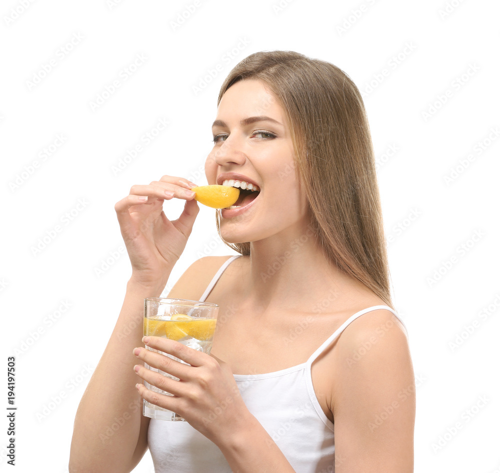 Beautiful young woman with glass of lemonade on white background Beautiful young woman with glass of lemonade on white background