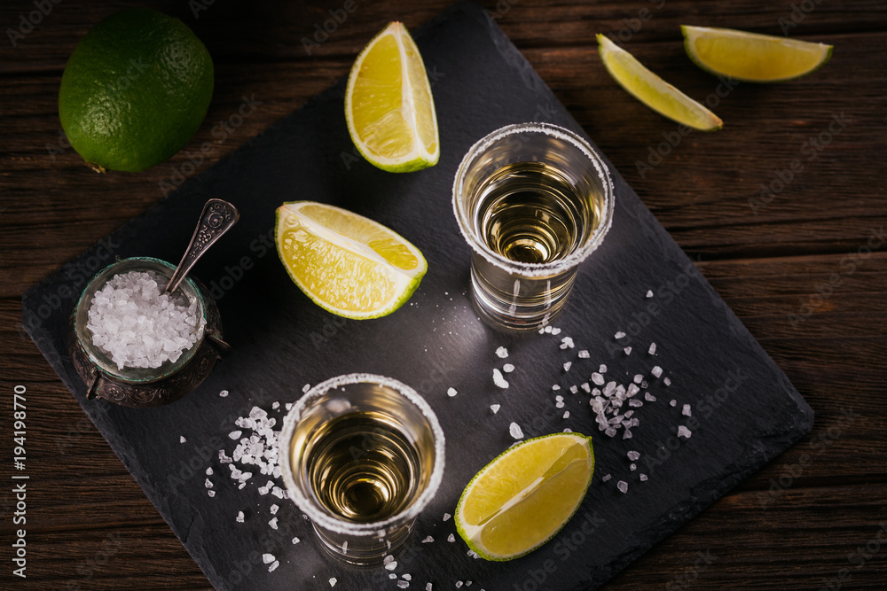 Tequila shot with lime and sea salt Tequila shot with lime and sea salt
