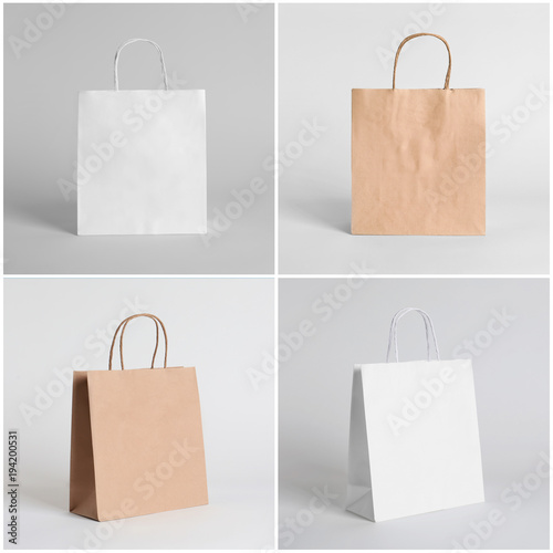 Set of blank shopping bags on light background. Mockup for design photo