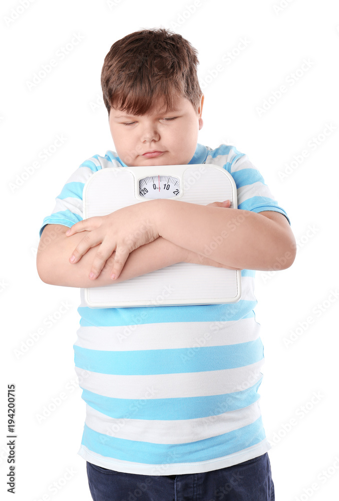 Overweight boy with floor scales on white background Overweight boy with floor scales on white background