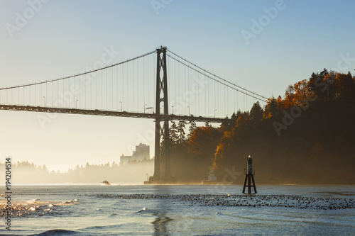 Lions Gate bridge and Stanley Park and Vancouver downtown in the fog