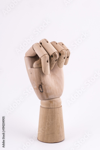 the gesture with a jointed wooden hand