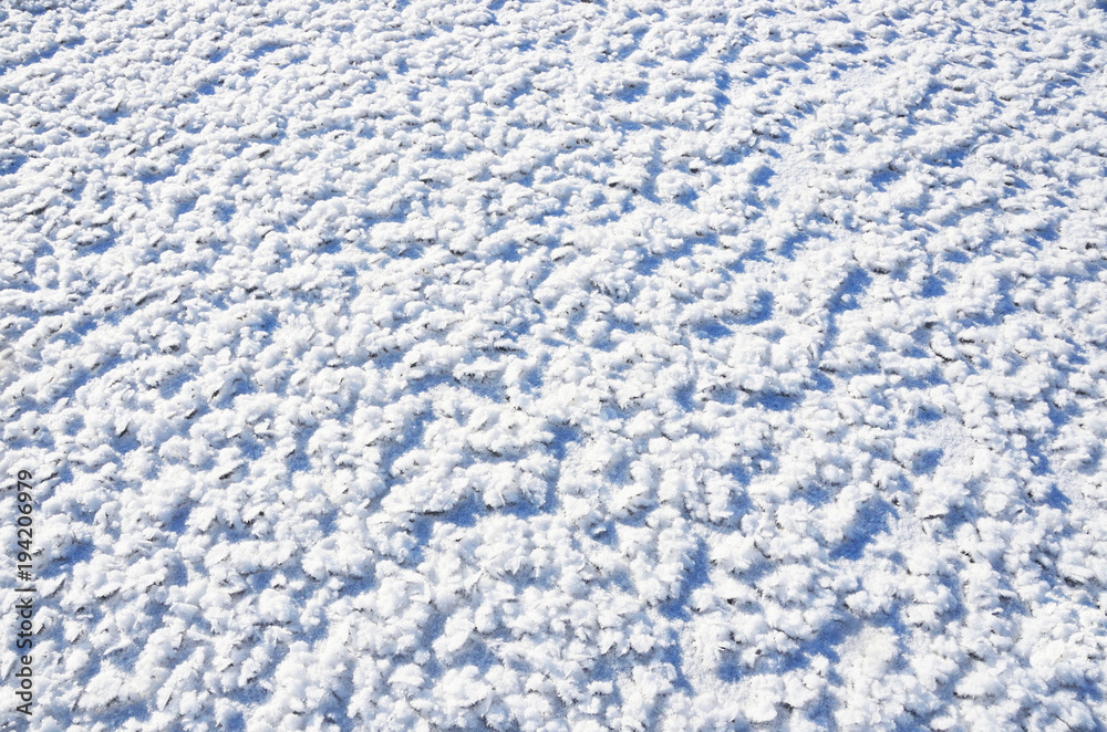 Fototapeta premium Фон из мелких льдинок со снегом