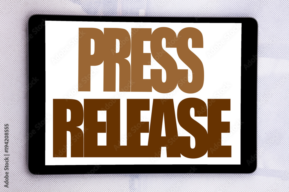 Fototapeta premium Hand writing text caption inspiration showing Press Release. Business concept for Statement Announcement Message written on tablet screen on the white background.