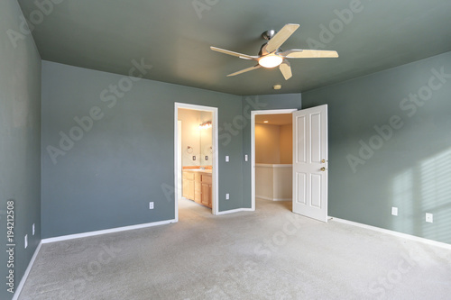 Empty room with grey ceiling and grey walls paint color.