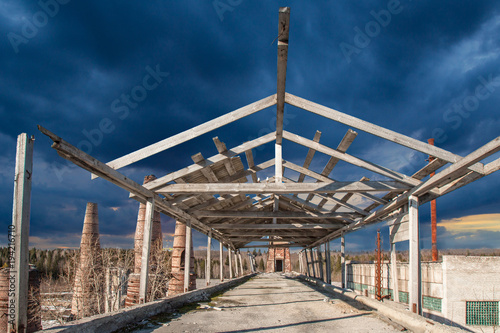Wooden canopy. Abandoned fa...