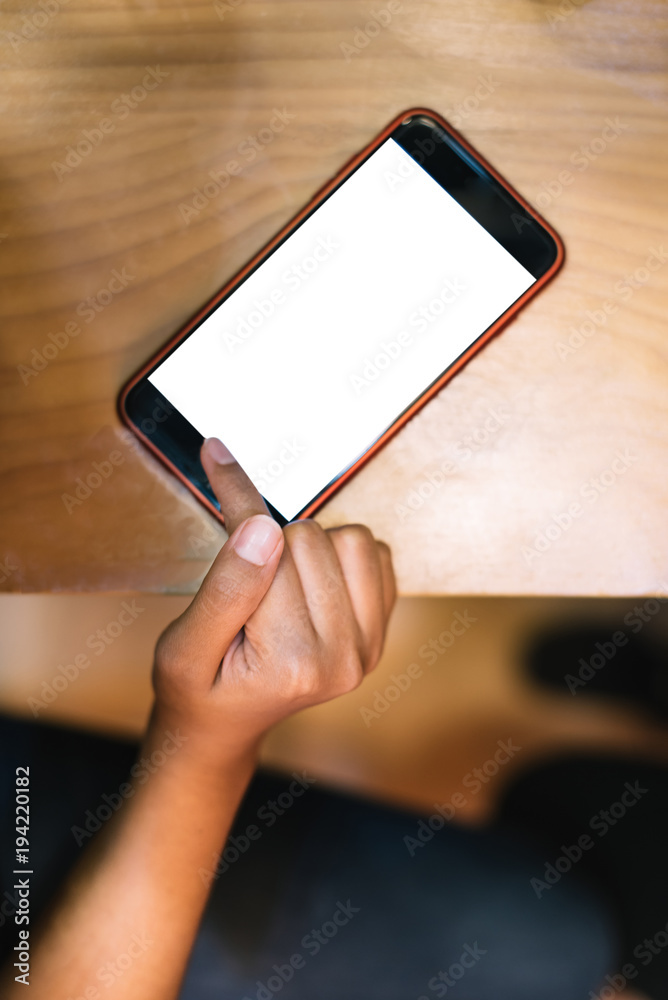 Close up hands using blank white screen smartphone.