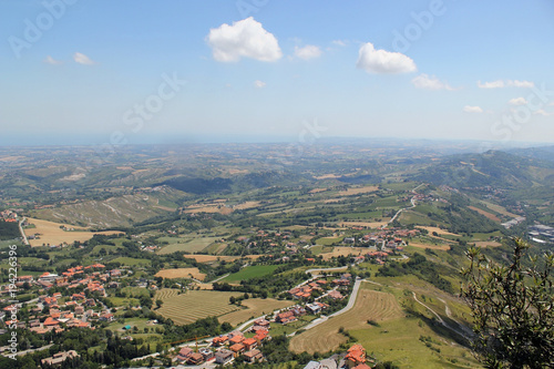 Typical sunny summer landscape of rural northern Italy from height of bird's flight.