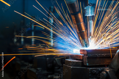 Welding robots movement in a car factory