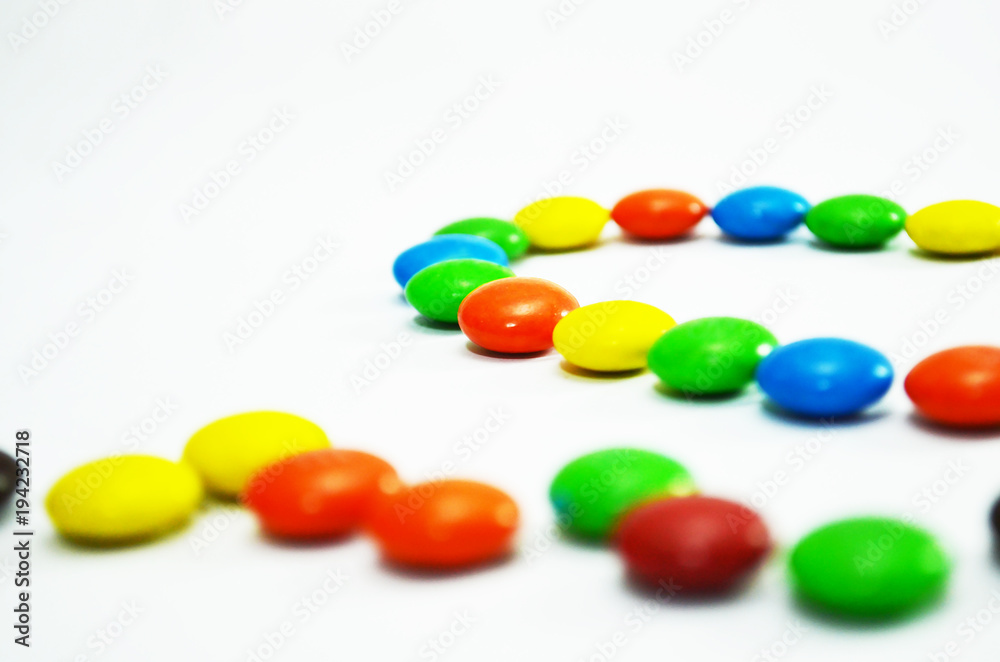 Close up of Colorful Chocolate Candy arrange in Heart Shape Concept Close up of Colorful Chocolate Candy arrange in Heart Shape Concept
