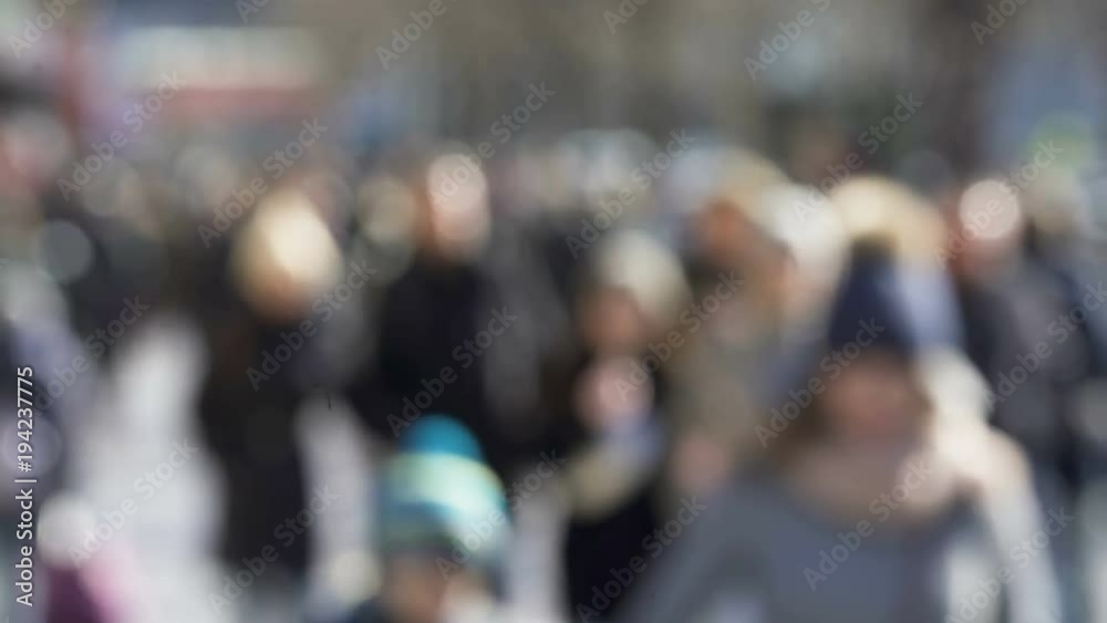 Blurred bokeh Anonymous Crowd Pedestrians On The Winter Street In City. . Blurred bokeh Anonymous Crowd Pedestrians On The Winter Street In City. .