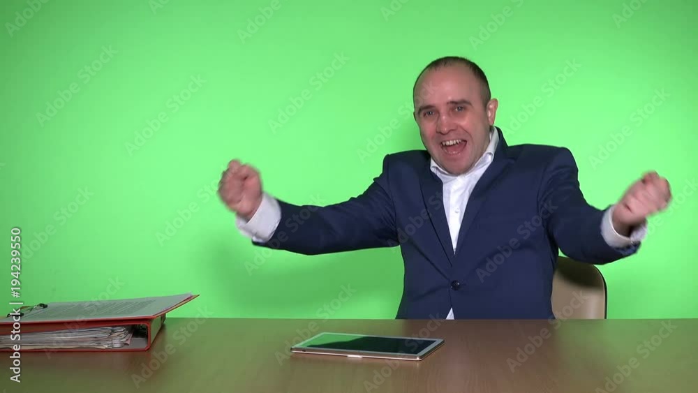 man in suit waiting for financial market results and show positive emotions man in suit waiting for financial market results and show positive emotions