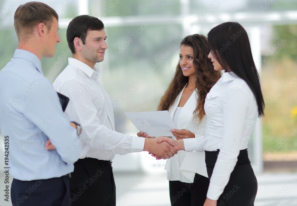 handshake business women and business partner