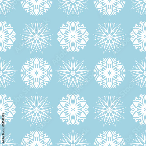 White floral seamless pattern on blue background