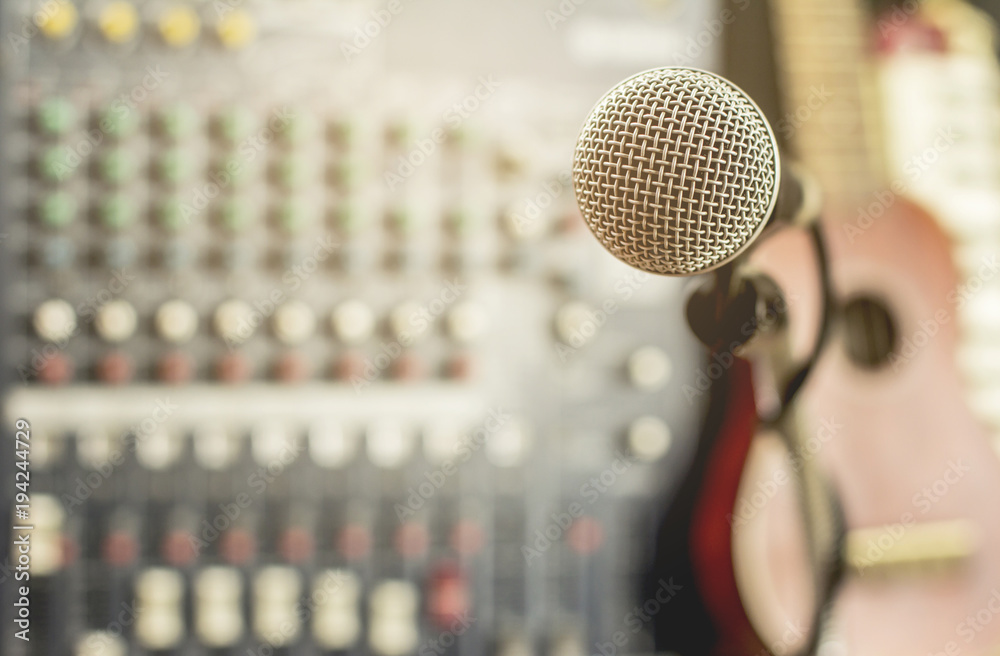 Microphone in room with recording device. Microphone in room with recording device.