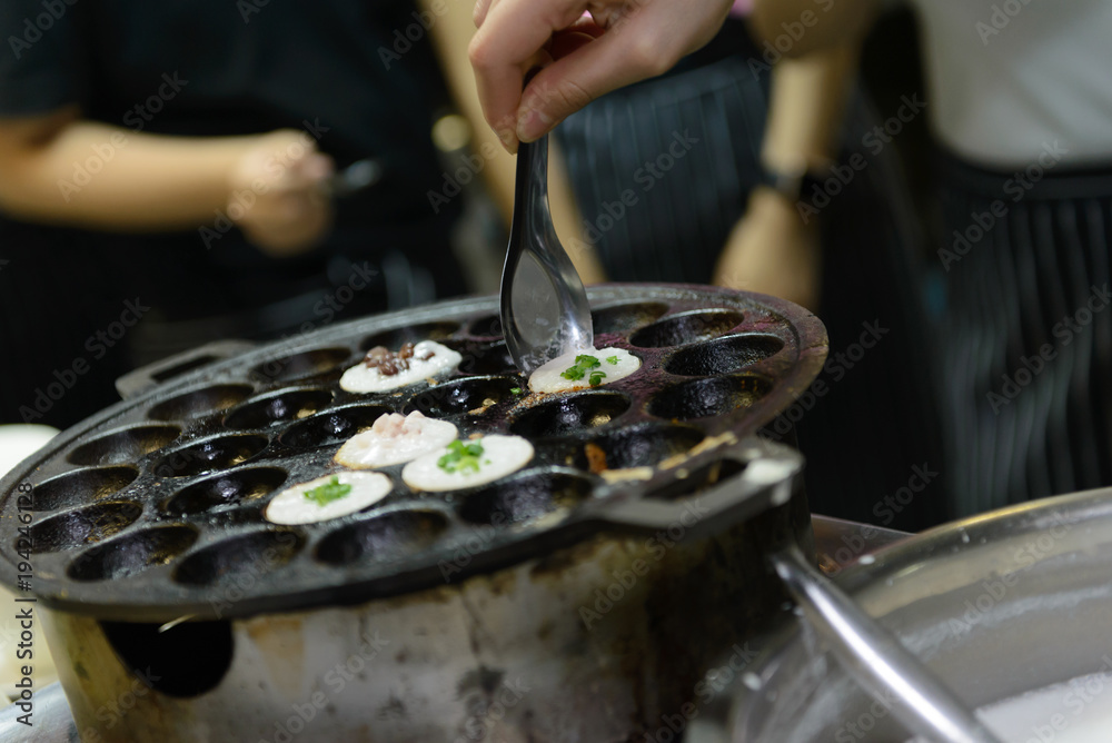 Thai Coconut pudding - Kanom Krok, Coconut milk mix sugar and flour, Thai Street food