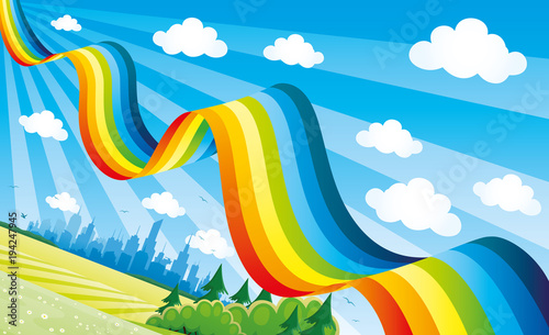 Bright rainbow in the blue sky over the city.